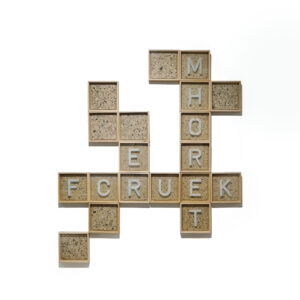 Christina-Quisumbing-Ramilo-’PUZZLED’-2019-Handmade-Paper-Made-from-Torn-Posters-of-Rirkrit-Tiravanija,-31.8x31.8x5cm-(each);-19 pieces.-Photo-courtesy-of-Gajah-Gallery