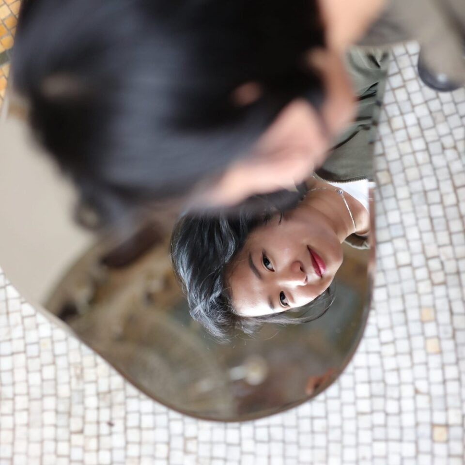 Giang Le. Profile Image from the artists website